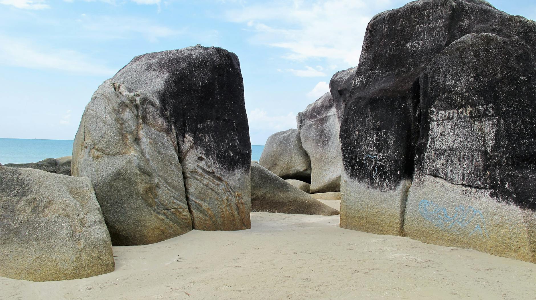 gray and black rocks on the shore